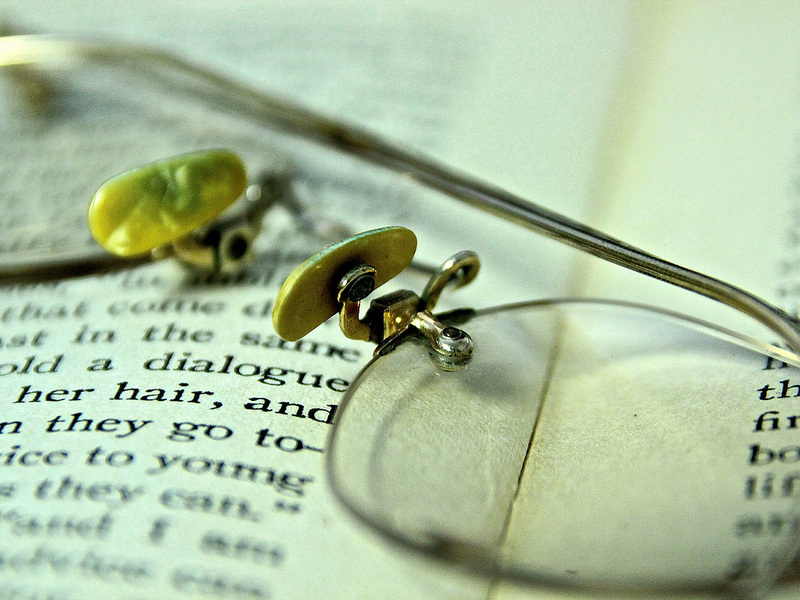 Glasses on Book Page